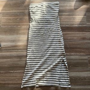 Sleeveless green and white striped dress
